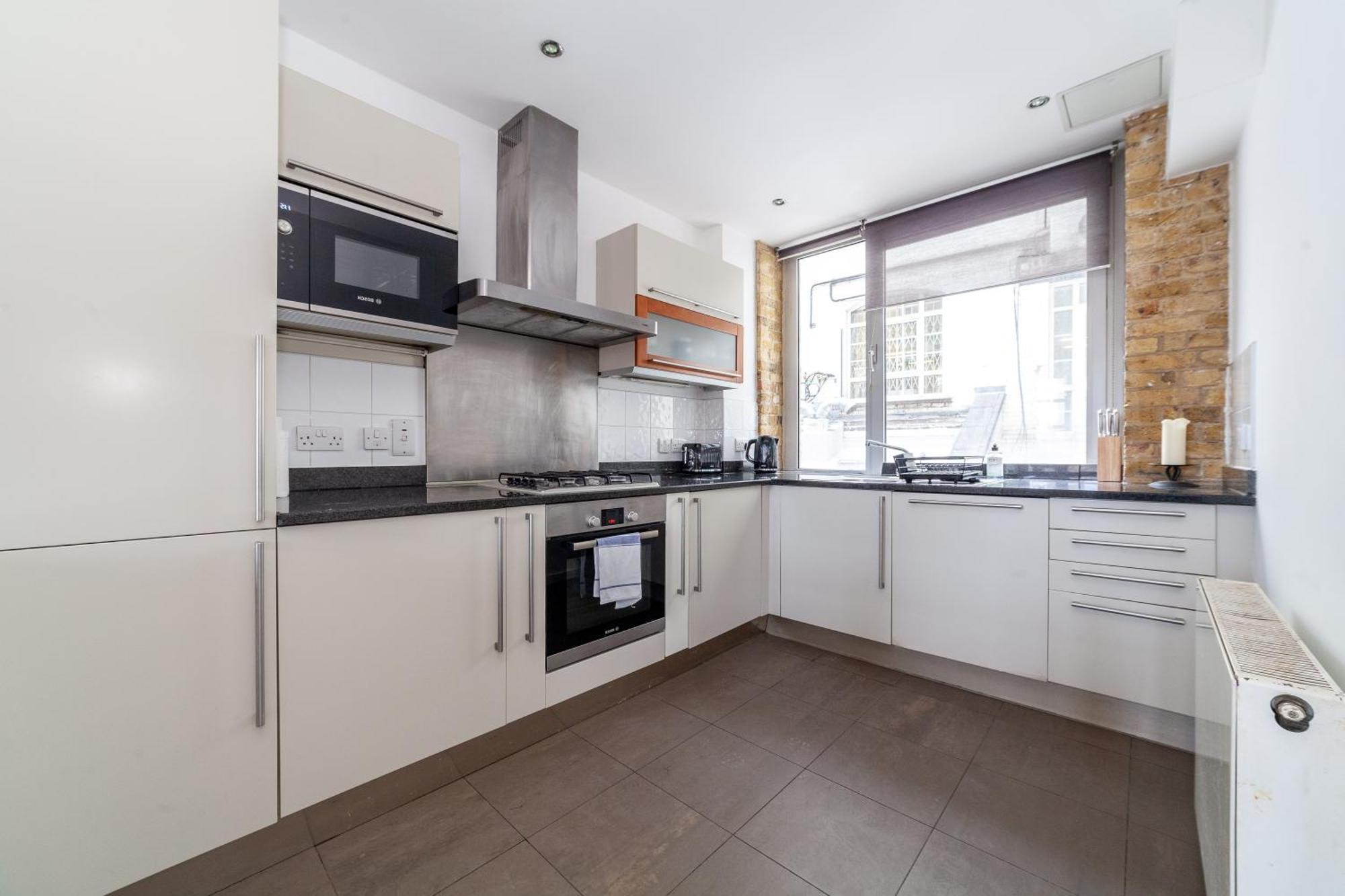 Elegance & Chic Design - 2-Bedroom Haven Londen Buitenkant foto